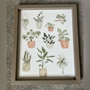 This plant photo has an attached wooden frame. 15x19”